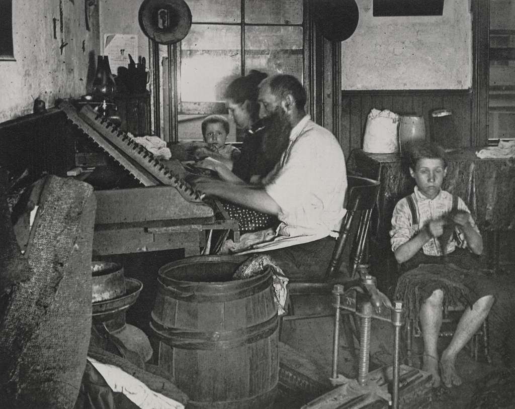 Bohemian cigar makers in a tenement room c. 1890